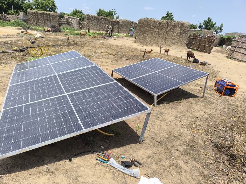 Solar panel installation in a rural Sahel village